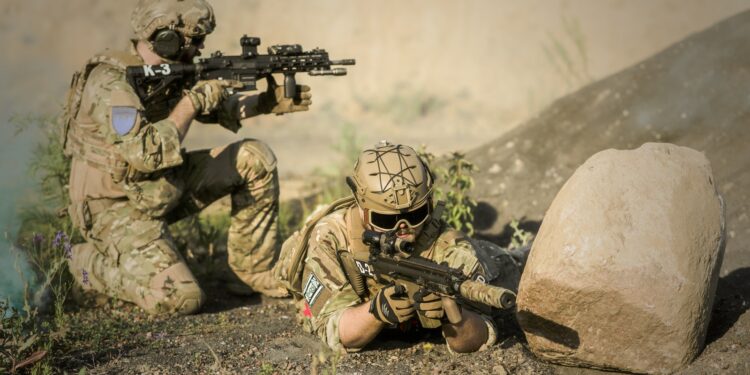 Military Sniping Near Rock